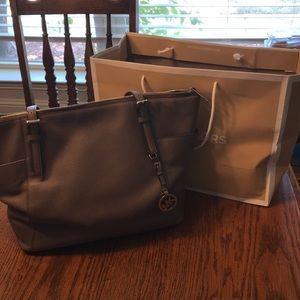 Michael Kors purse/ can be used as carry on.